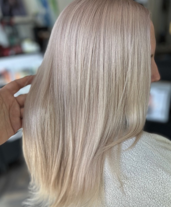 Client hair by Annah Davis — glossy finished style